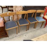 A SET OF FOUR MID 20TH CENTURY DINING CHAIRS