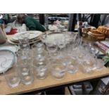 A QUANTITY OF GLASSES INCLUDING, BRANDY, WINE, WHISKY TUMBLERS, TANKARDS, DESSERT DISHES, ETC