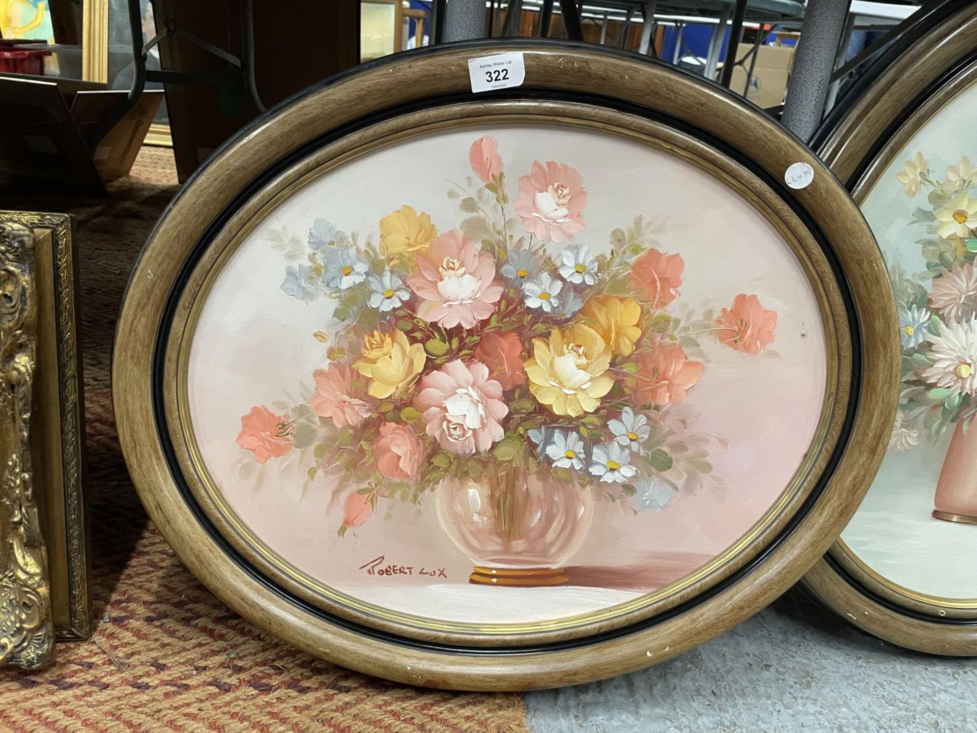 ROBERT COX (1934-2001 U.S.A.), FLOWERS IN A VASE, OVAL OIL ON CANVAS, SIGNED, 39X49CM, FRAMED