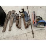A LARGE ASSORTMENT OF TOOLS TO INCLUDE A COBBLERS LAST, A MALLET AND A TOW BAR ETC