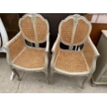 A PAIR OF CONTINENTAL STYLE BERGERE ARM CHAIRS