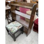 A SMALL CARVED OAK STOOL AND FOUR TIER OPEN BOOKCASE, 30" WIDE