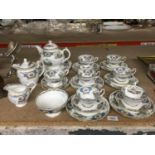 A COALPORT 'BROADWAY BLUE' CHINA TEASET COMPRISING CUPS, SAUCERS, SIDE PLATES, TEAPOTS, SUGAR BOWL