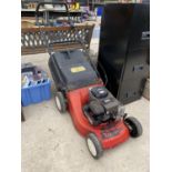 A CHAMPION PETROL LAWN MOWER WITH BRIGGS AND STRATTON ENGINE AND GRASS BOX