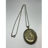 A LARGE ORNATE HALLMARKED SILVER LOCKET WITH CHAIN
