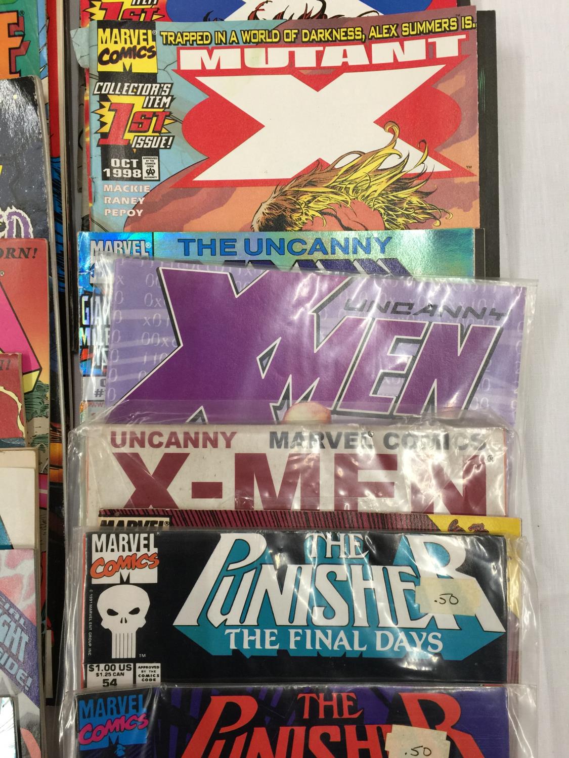 A COLLECTION OF 23 1990'S MARVEL COMICS TO INCLUDE X-MEN, WOLVERINE, THE PUNISHER, MUTANT X, STAR - Bild 6 aus 9