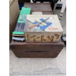 A VINTAGE TRAVEL TRUNK, A HACK SAW AND A JOINT MASTER MITRE SAW