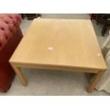 A MODERN 31.5" SQUARE COFFEE TABLE
