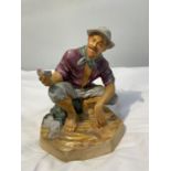 A ROYAL DOULTON FIGURE 'BEACHCOMBER' HN2487 IN A MATTE FINISH