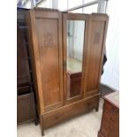 A MID 20TH CENTURY OAK MIRROR-DOOR WARDROBE, 46" WIDE