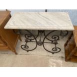 A MODERN CONSOLE TABLE ON SHAPED CAST IRON BASE WITH MARBLE TOP, 35" WIDE