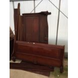 A CONTINENTAL 5' SLEIGH BED