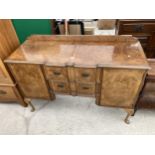 A MID 20TH CENTURY WALNUT AND CROSSBANDED SIDEBOARD BY CAMEO FURNITURE, ON CABRIOLE LEGS, 55" WIDE