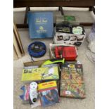 AN ASSORTMENT OF ITEMS TO INCLUDE AN EDGE TRIMMER, A BATTERY CHARGER AND VARIOUS GAMES ETC