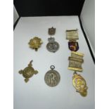SEVEN VARIOUS MEDALS AND BADGES