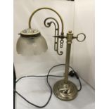 AN ANTIQUE STYLE BRASS DESK LAMP WITH GLASS SHADE