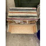 A RECORD CASE CONTAINING AN ASSORTMENT OF LP RECORDS