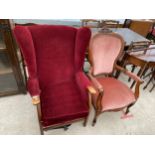 A PARKER KNOLL STYLE FIRESIDE CHAIR AND VICTORIAN STYLE UPHOLSTERED ARMCHAIR