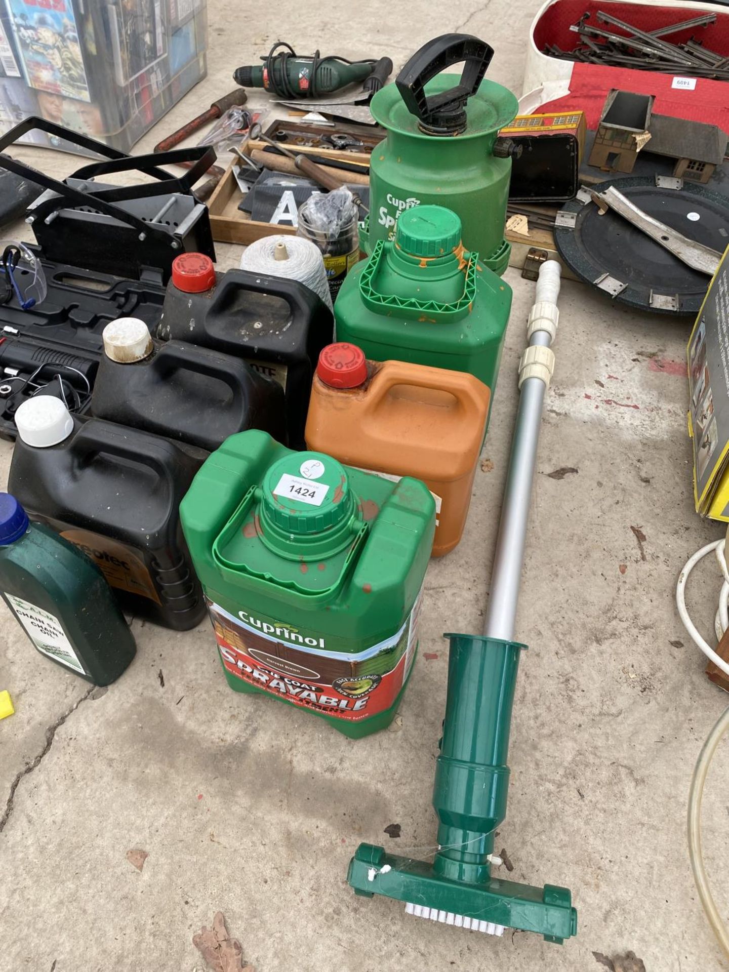 A LARGE QUANTITY OF CREOCOTE AND A GARDEN SPRAYER
