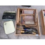 AN ASSORTMENT OF SHARPENING STONES AND WOOD CHISELS ETC
