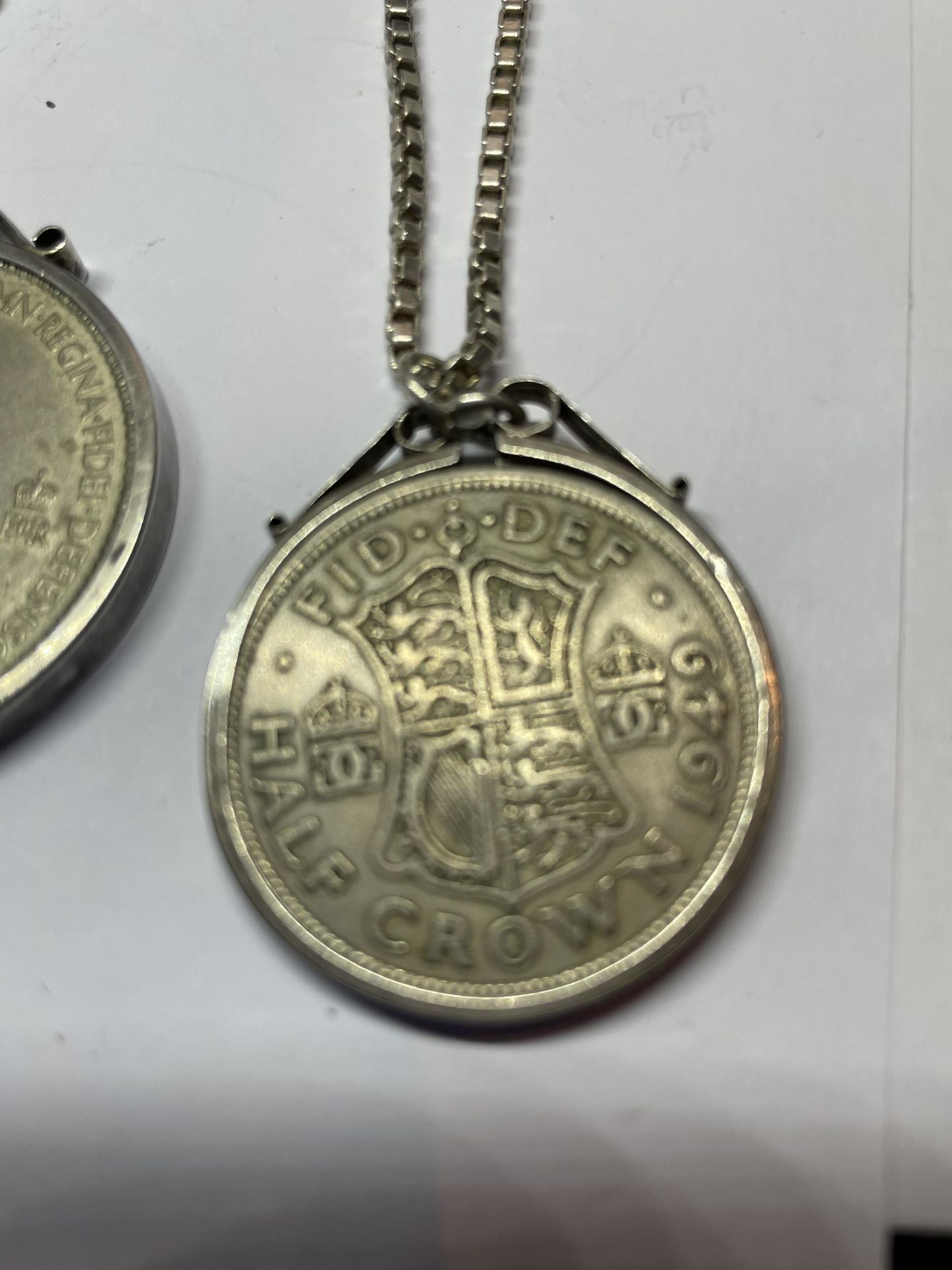 TWO MOUNTED COINS ON SILVER CHAINS TO INCLUDE A FIVE SHILLINGS AND A HALF CROWN - Image 5 of 6