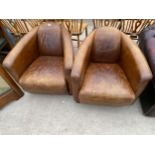 A PAIR OF MODERN LEATHER V-SHAPED AVIATOR CHAIRS