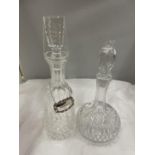 TWO CUT GLASS DECANTERS, ONE WITH A SILVER 'SHERRY' COLLAR