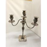 A DECORATIVE REGENCY STYLE CANDLEABRA TO HOLD FOUR CANDLES