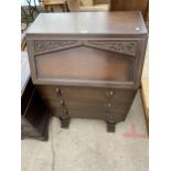 A MID 20TH CENTURY OAK BUREAU, 30" WIDE