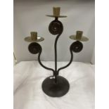 A THREE STEMMED METAL CANDLESTICK HEIGHT 41CM