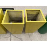 A PAIR OF YELLOW FIBRE GLASS PLANTERS (H:73CM)