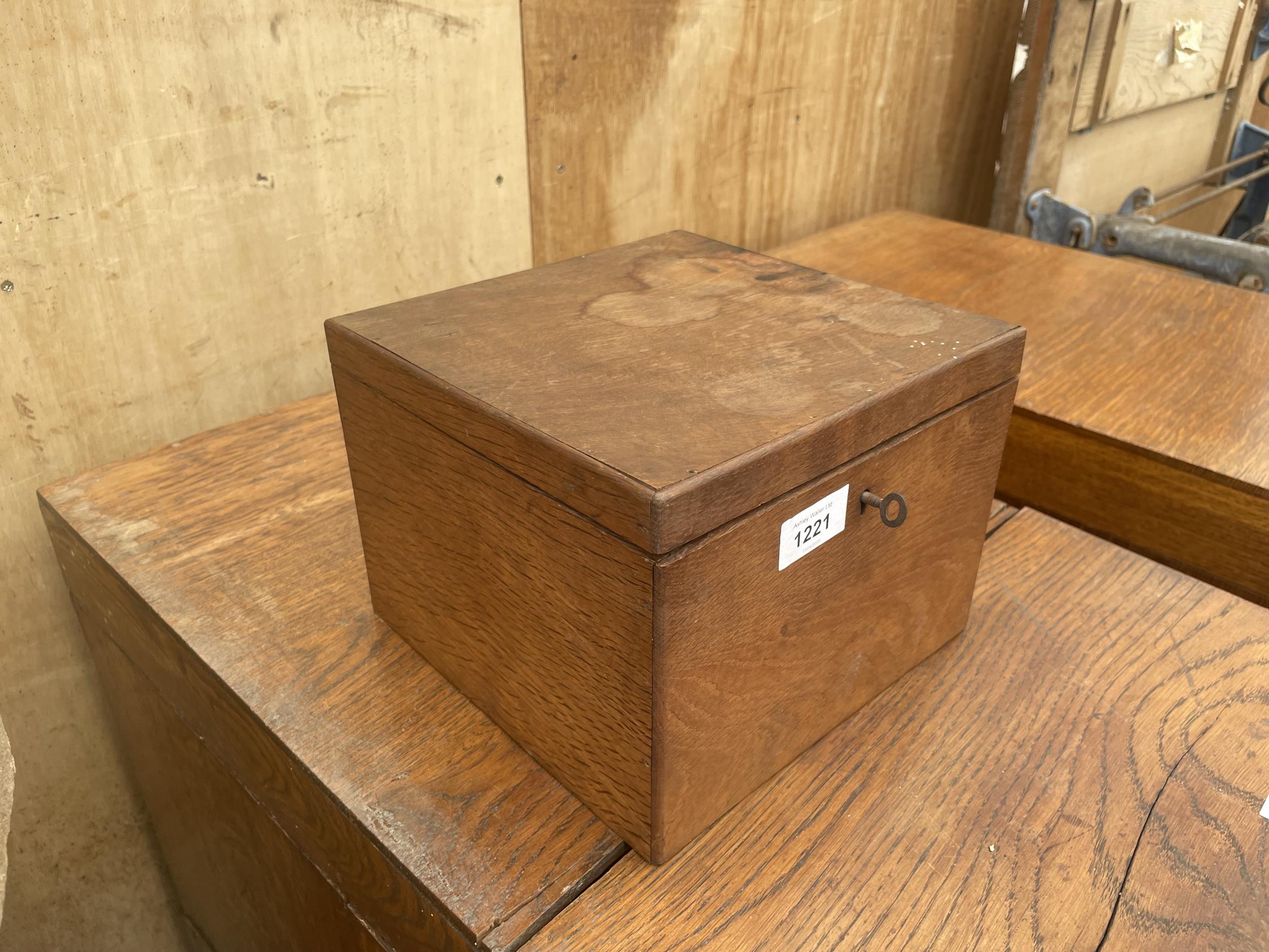 A VINTAGE WOODEN LETTER BOX WITH HINGED LOCKABLE LID AND KEY