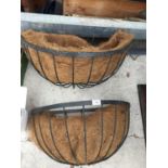 A PAIR LARGE OF WROUGHT IRON HAYRACK PLANTERS WITH INSERTS