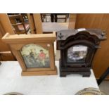 A PINE CASED WALL CLOCK AND A DECORATIVE MANTLE CLOCK BOTH BELIEVED WORKING BUT NO WARRANTY