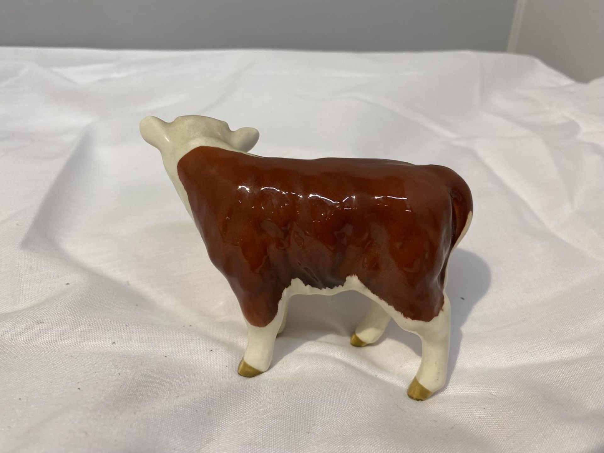 TWO BESWICK FIGURES, A HEREFORD COW AND A CALF - Image 7 of 8