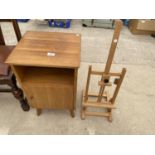 A MID 20TH CENTURY BEDSIDE LOCKER AND SMALL MODERN EASEL