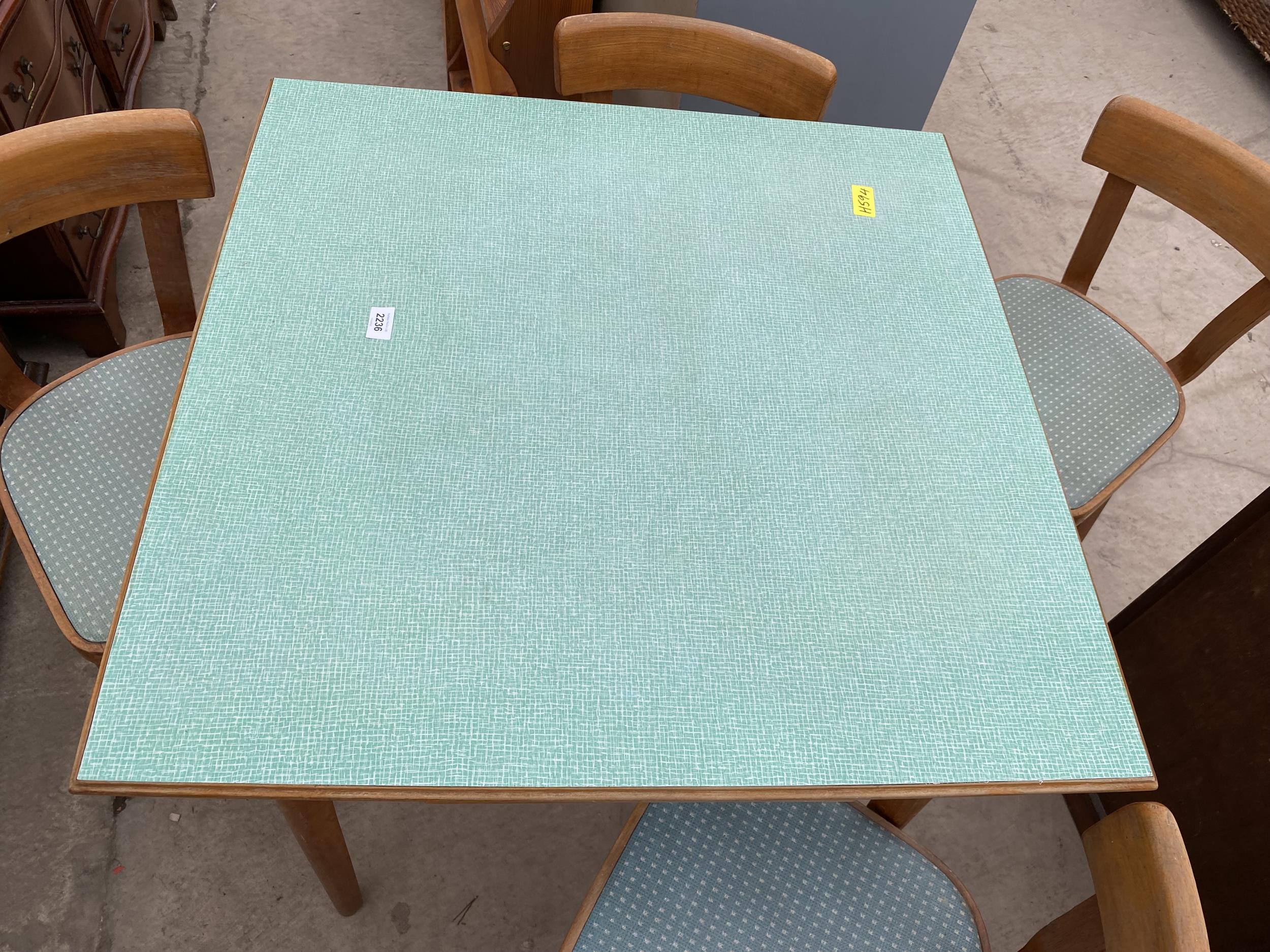 A 1950'S FORMICA TOP DRAW-LEAF KITCHEN TABLE AND FOUR CHAIRS - Image 4 of 8