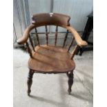 A VICTORIAN ELM COW HORN CAPTAINS CHAIR