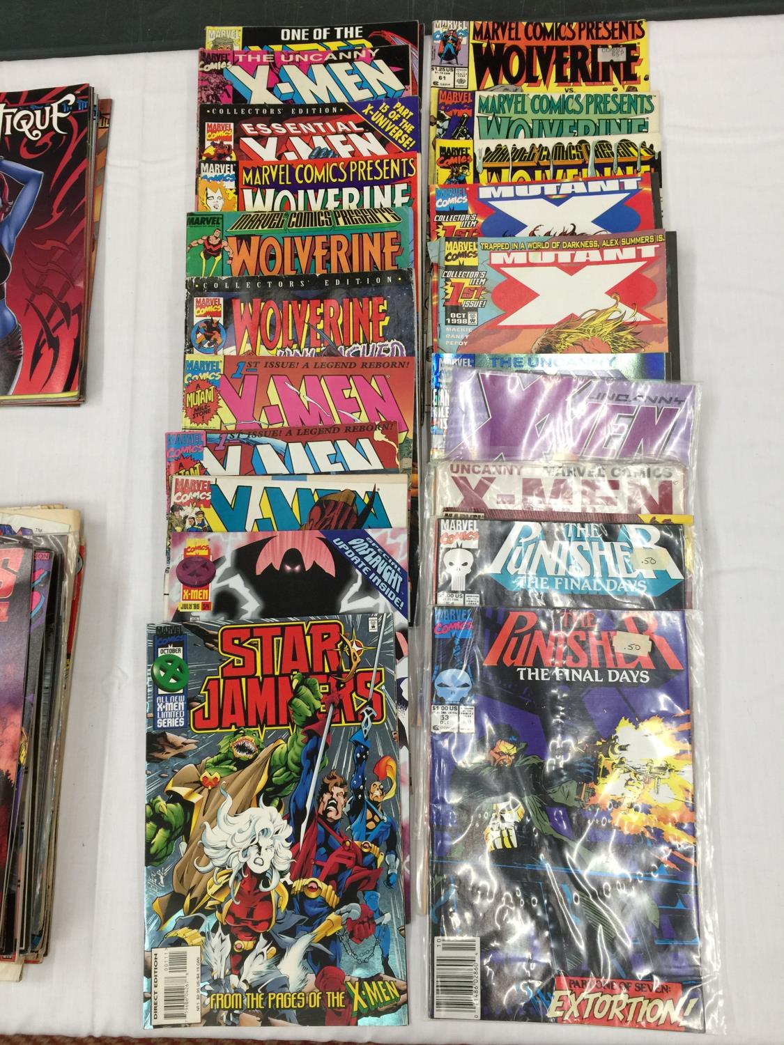 A COLLECTION OF 23 1990'S MARVEL COMICS TO INCLUDE X-MEN, WOLVERINE, THE PUNISHER, MUTANT X, STAR