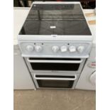 A WHITE HOTPOINT ELECTRIC OVEN AND HOB