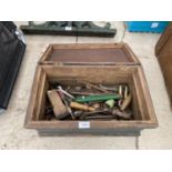 A VINTAGE WOODEN TOOL CHEST WITH AN ASSORTMENT OF HAND TOOLS TO INCLUDE WRENCHES, SPANNERS AND SNIPS