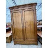 A BRIGITTE FORESTIER CHERRY WOOD TWO DOOR WARDROBE, 58" WIDE