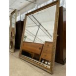 A MODERN GILT FRAMED WALL MIRROR, 49X40"