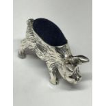 A SILVER PIG PIN CUSHION