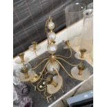 A DECORATIVE BRASS LIGHT FITTING AND FURTHER BRASS DOOR FURNITURE