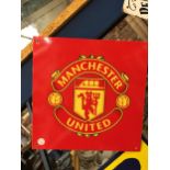 A MANCHESTER UNITED METAL SIGN 30.5CM X 30.5 CM