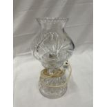 A CUT GLASS TWO PIECE HURRICANE LAMP 31CM TALL