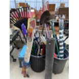 A LARGE ASSORTMENT OF GARDEN TOOLS TO INCLUDE SHEARS, FORKS AND A LIGHT BOARD ETC
