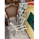 A PAIR OF VINTAGE CAST IRON BENCH ENDS AND FLORAL BENCH BACK