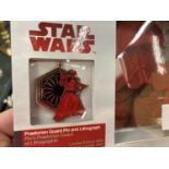 A BOXED STAR WARS PRAETORIAN GUARD PIN AND LITHOGRAPH